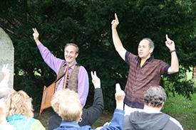 Storytellers Giving Peace Sign to the Audience